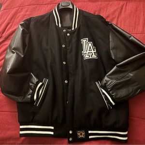 Genuine Merchandise Black Varsity Jacket with White Accents